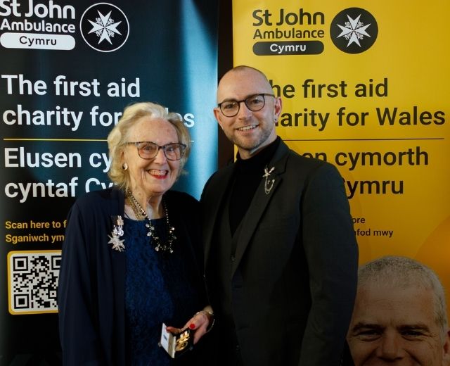 Eunice O’Hara OStJ, pictured here with Andy King OStJ, County Commissioner for Dyfed, received an Ultra Long Service Medal and 2 Gilt Bars for her 60 years of dedicated service as part of St John Ambulance Cymru.
